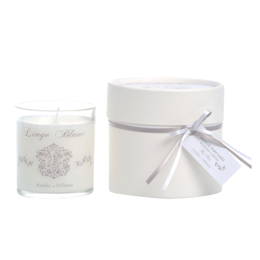Candle with packaging labeled 'Linge Blanc' on a white background