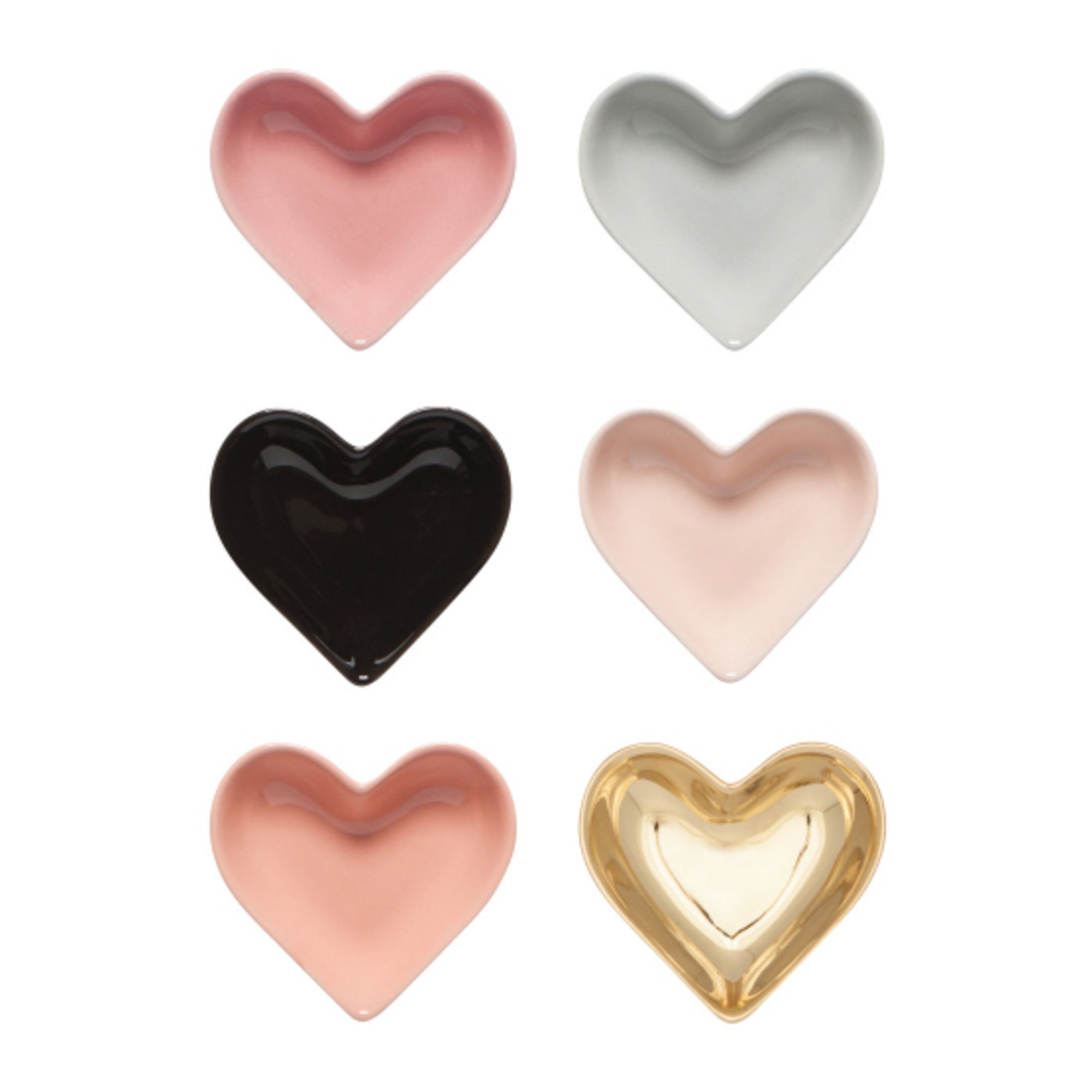 Set of six heart-shaped dishes in different colors on a white background