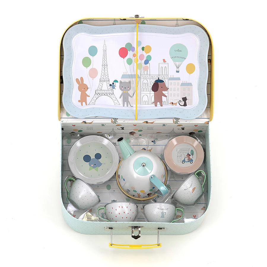 Children's tea set in a suitcase with cartoon characters and balloons on the lid.