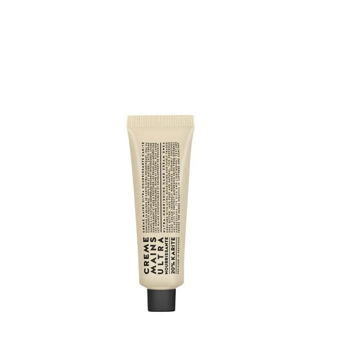 A tube of nourishing shea hand cream with product information printed on the label.