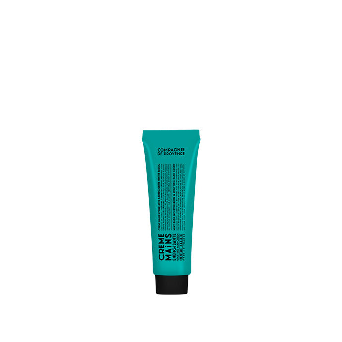 A tube of hand balm with a teal blue label, titled 'Uplifting Mint Basil Hand Balm'.
