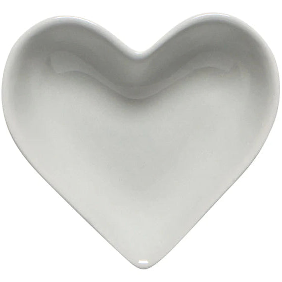 Heart-shaped white ceramic plate on a white background