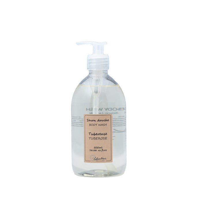 A clear plastic bottle with a pump dispenser, labeled as 'Authentique Tuberose Body Wash'.