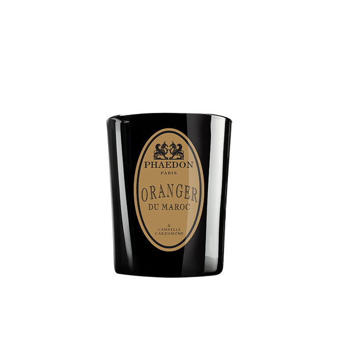 A black Phaedon scented candle labeled 'Oranger du Maroc' in a glass container.