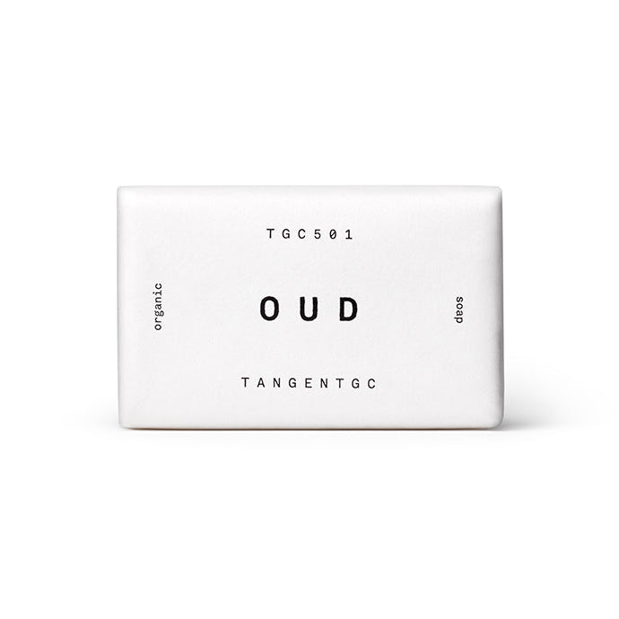 A white bar of soap with 'OUD' and 'Tangent GC' text printed on it, indicating the fragrance and brand.