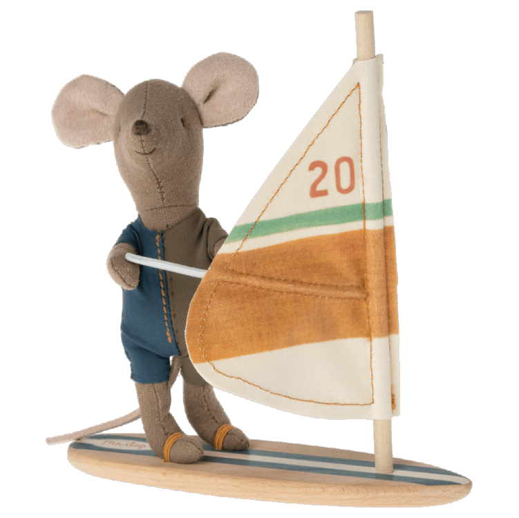 A toy figurine of a mouse wearing a sailor suit and sailing a small sailboat. The boat has a wooden texture with a number '20' on it, and the mouse is primarily gray with blue and beige accents.