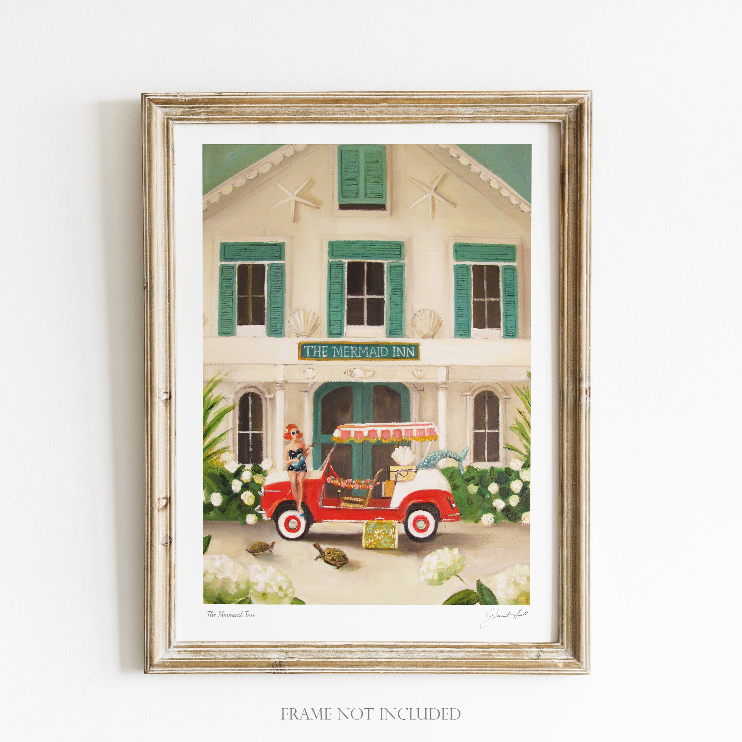 Framed artwork of a house with a red car and people outside, on a white background.
