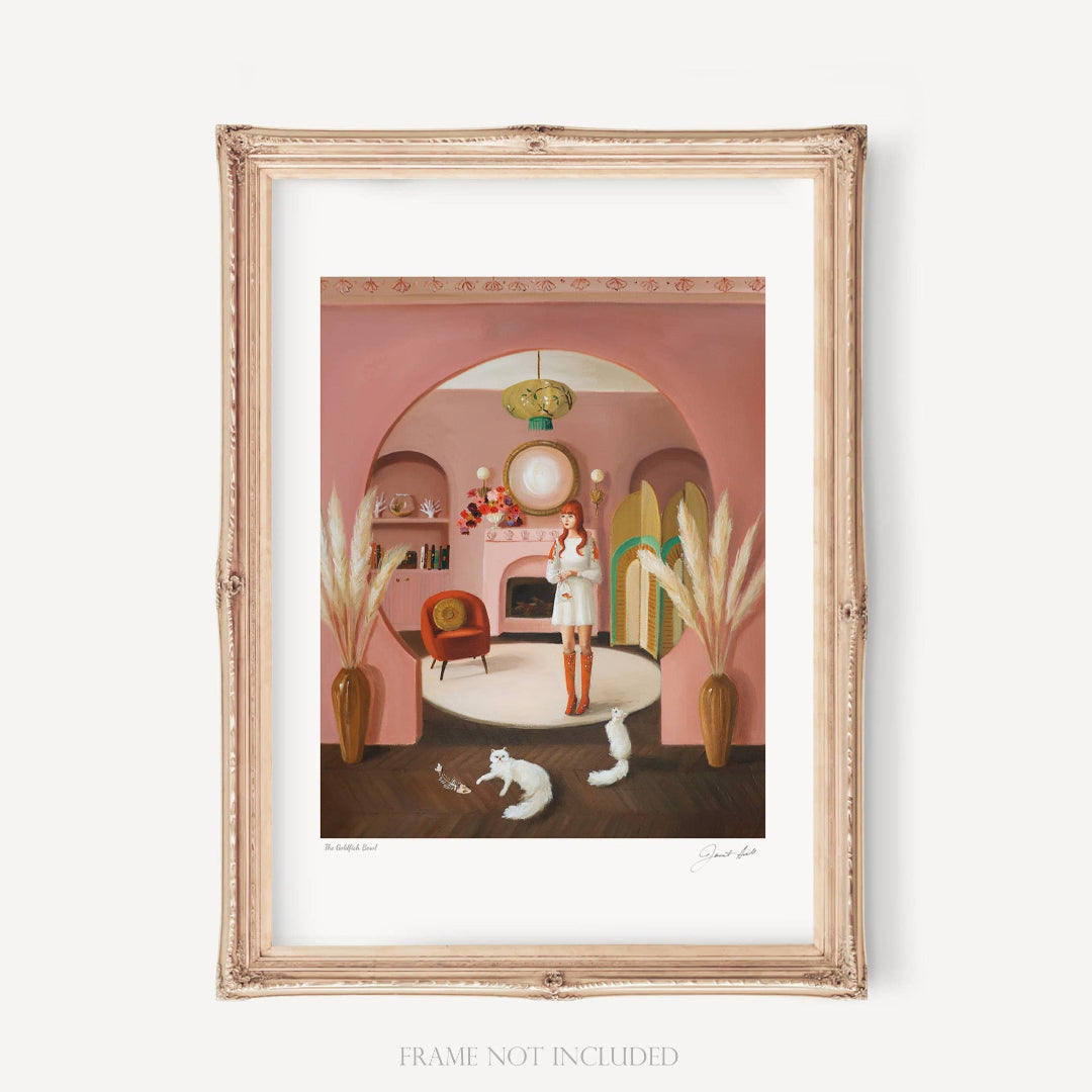 A framed art print featuring a whimsical scene with a person and a cat in a goldfish bowl, set against a pink-toned backdrop.