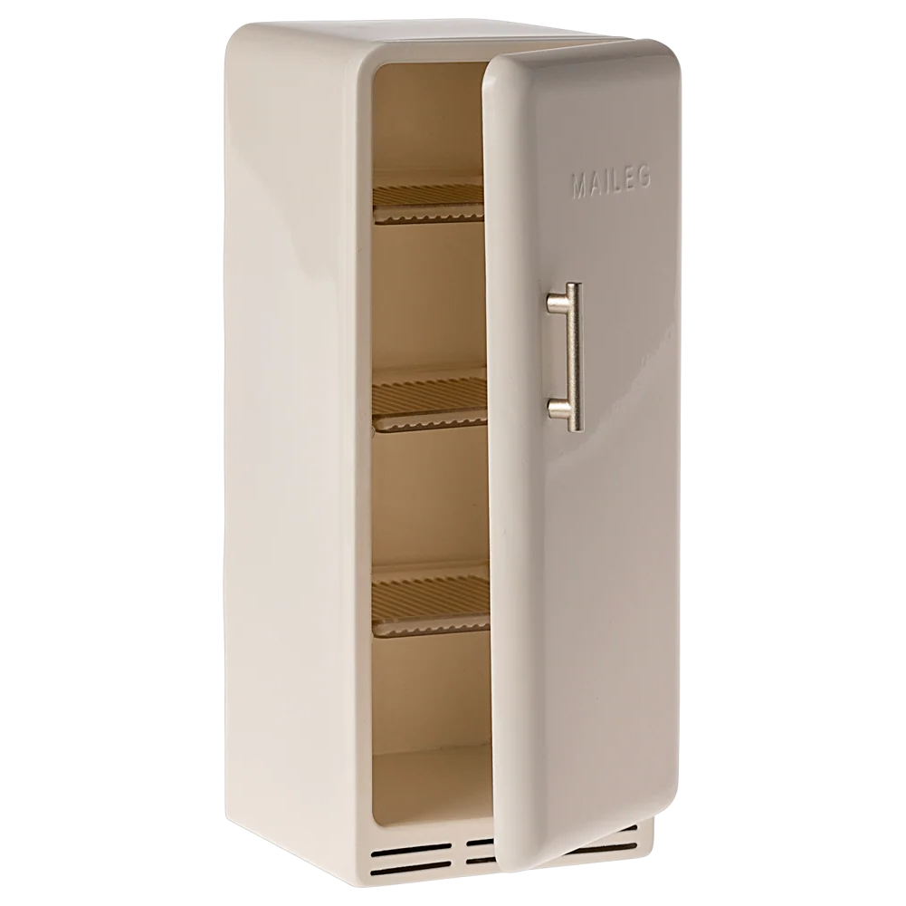 Beige refrigerator with open door on a white background