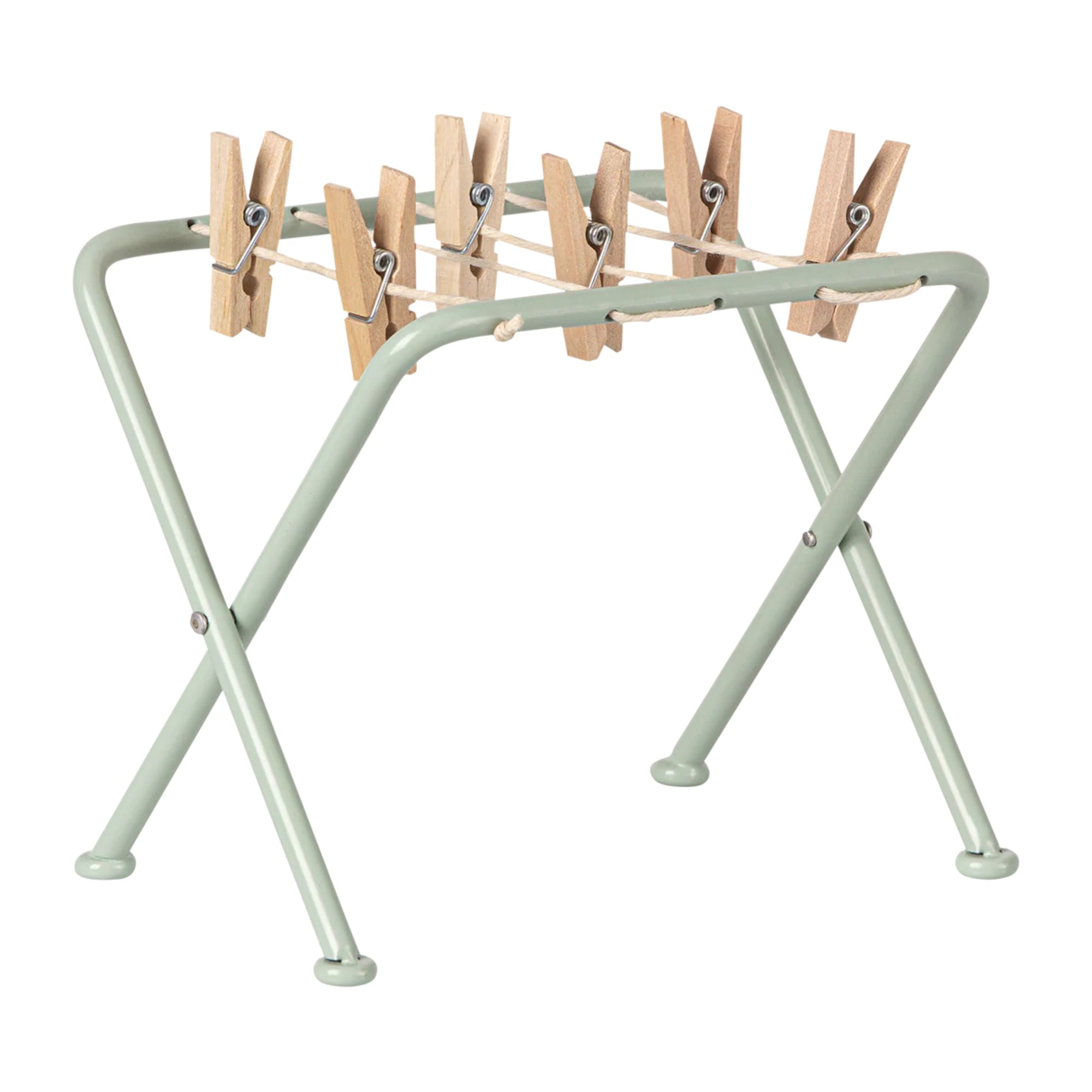 Light green metal clothes rack with wooden pegs on a white background