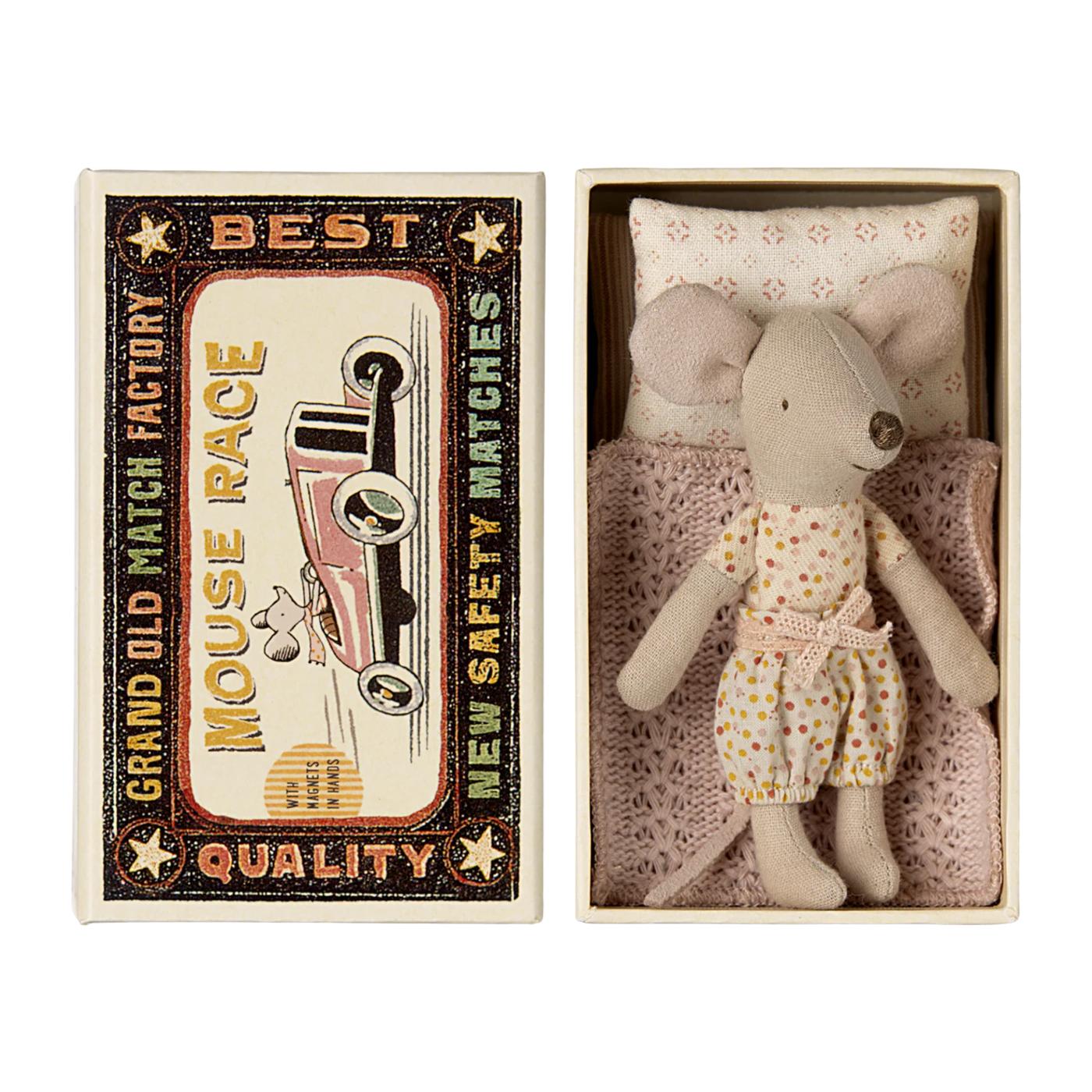 Small stuffed mouse toy in a matchbox with a vintage-style label.