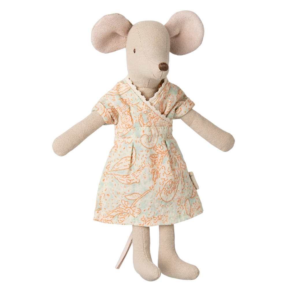 A plush toy resembling a light-colored mouse with a dress, standing upright.