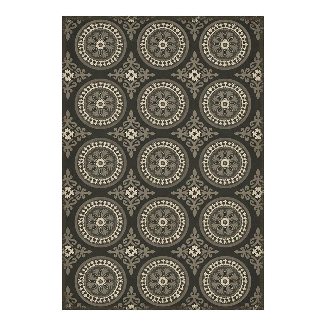 Decorative floor mat with circular pattern on a white background