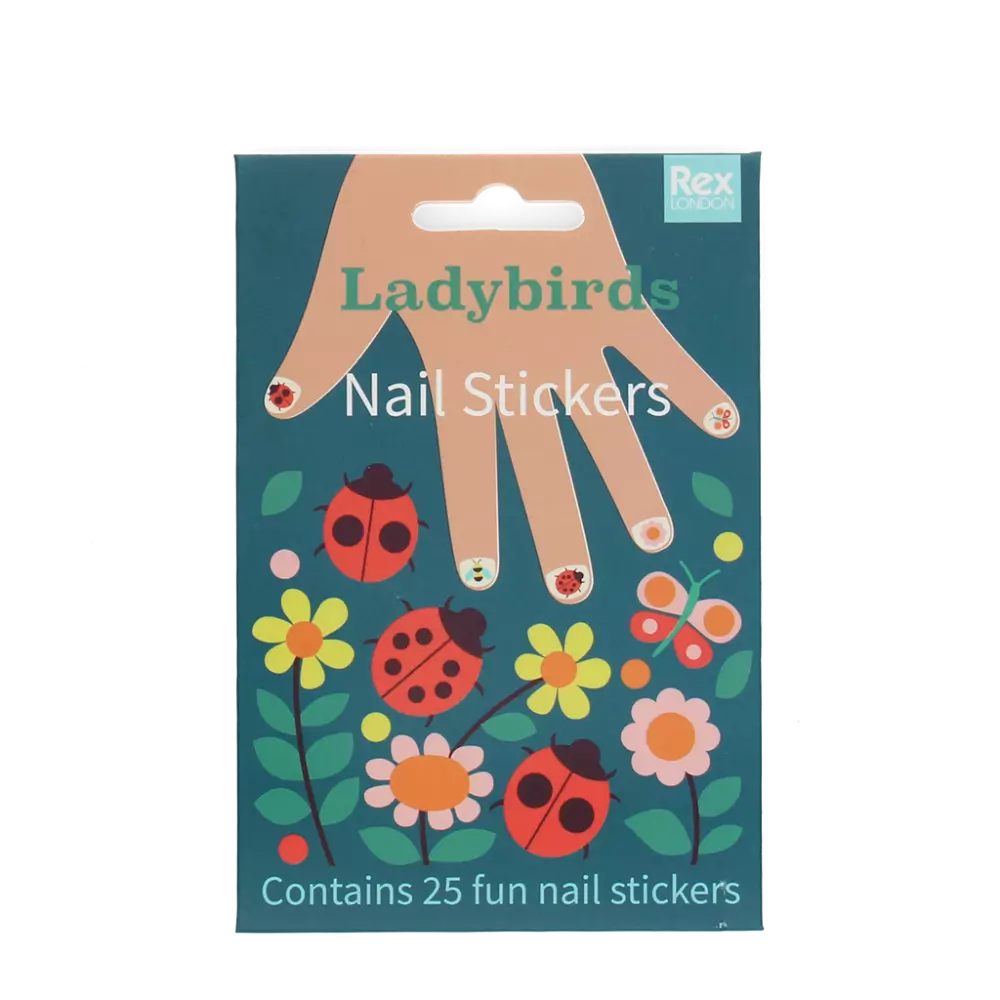 Packaging of Ladybirds nail stickers with a hand illustration and floral design.