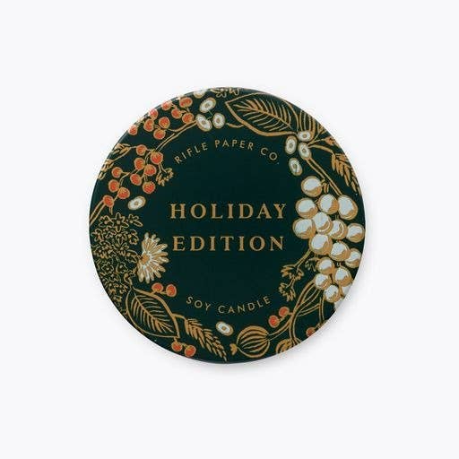 Decorative candle label with floral design and 'Holiday Edition' text on a white background