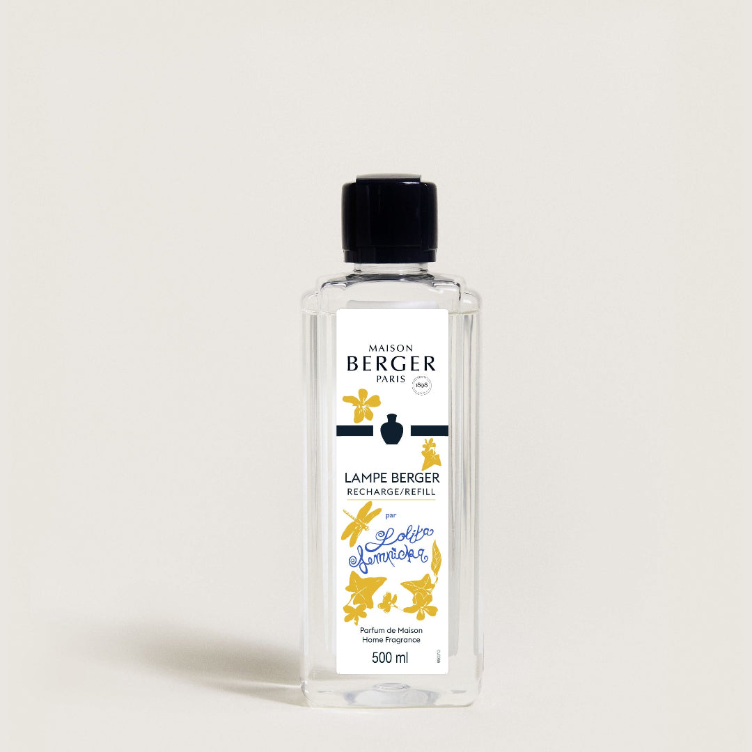 Bottle of Maison Berger lamp refill on a white background