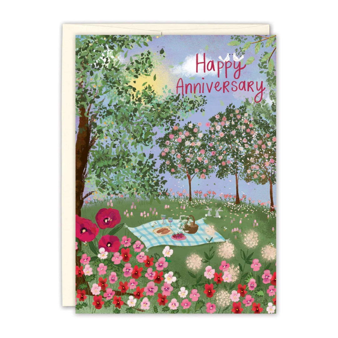 Greeting card with a garden scene and 'Happy Anniversary' text