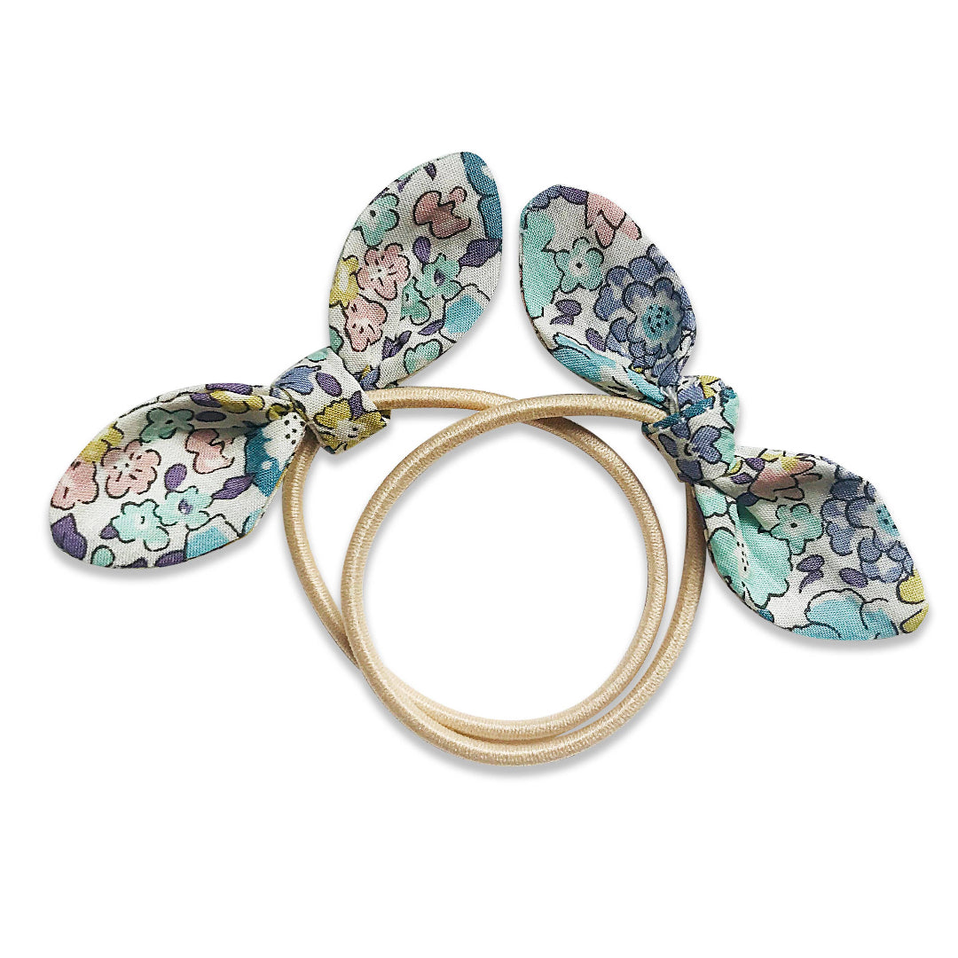 Floral hair tie with on a white background