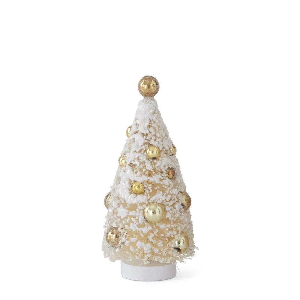 Small decorative Christmas tree with gold ornaments on a white background