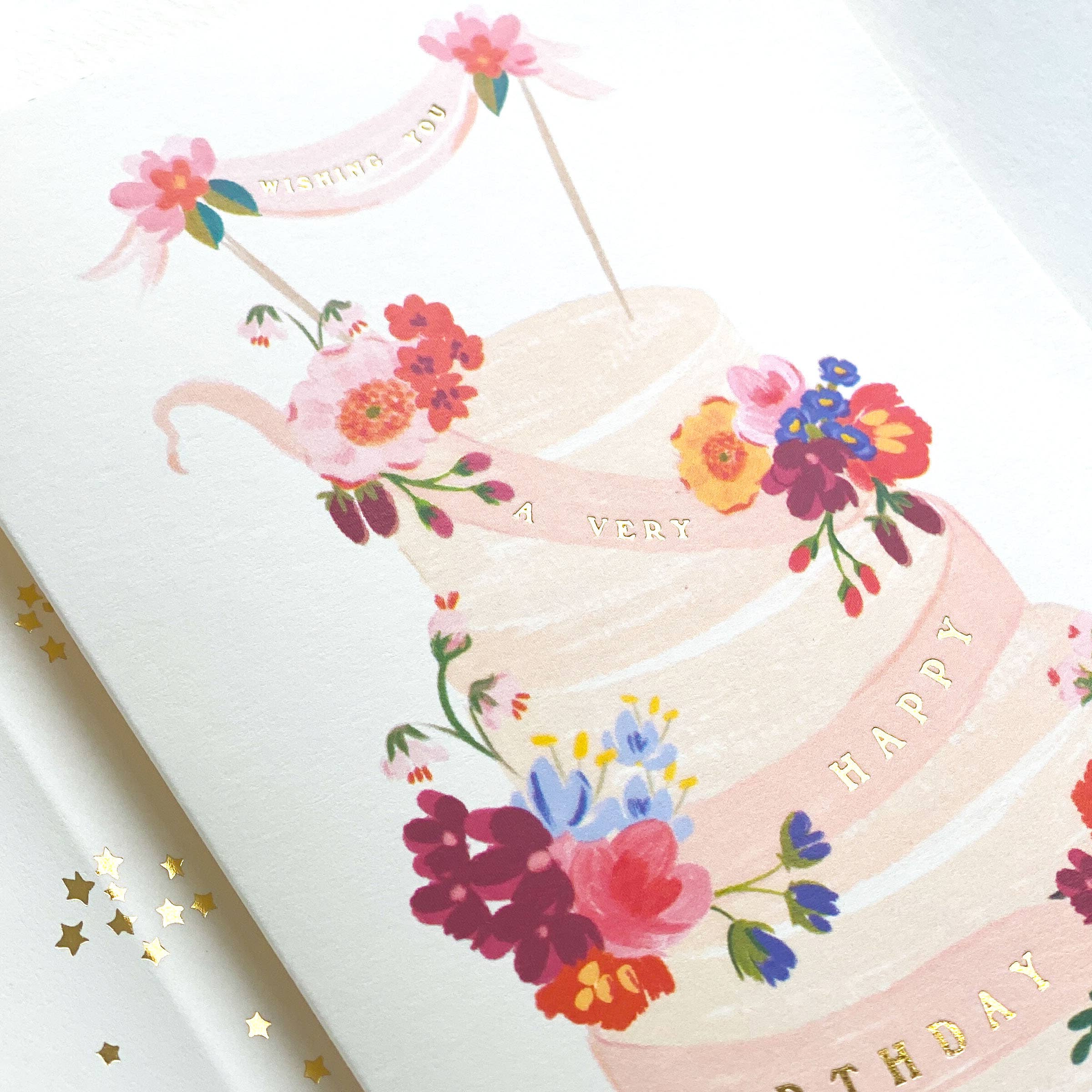 Carte de vœux avec un gâteau d'anniversaire