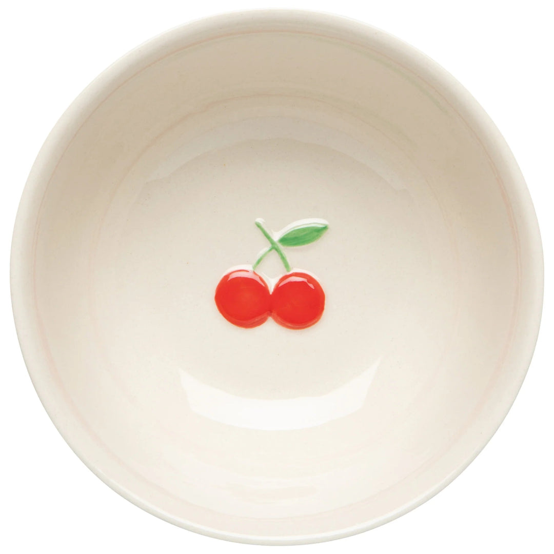 White bowl with red cherries on a white background