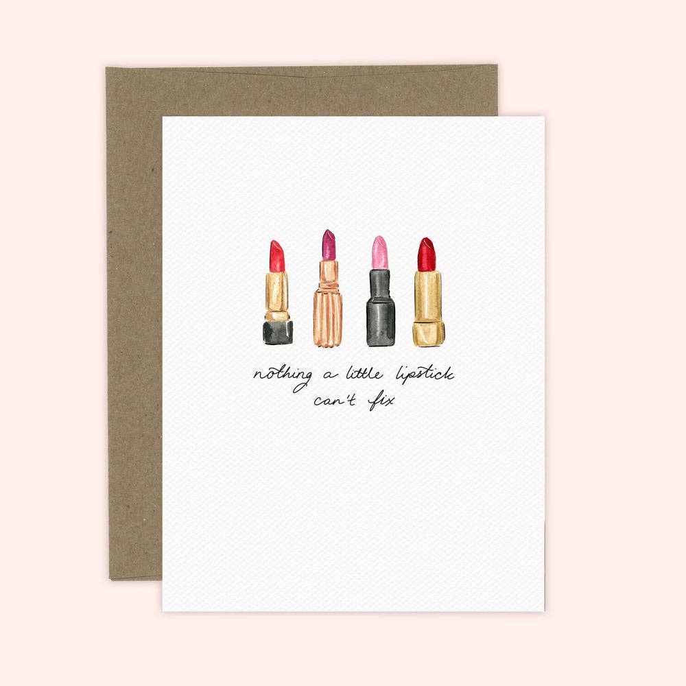 Greeting card with illustrations of lipsticks and text 'nothing a little lipstick can't fix' on a beige background.
