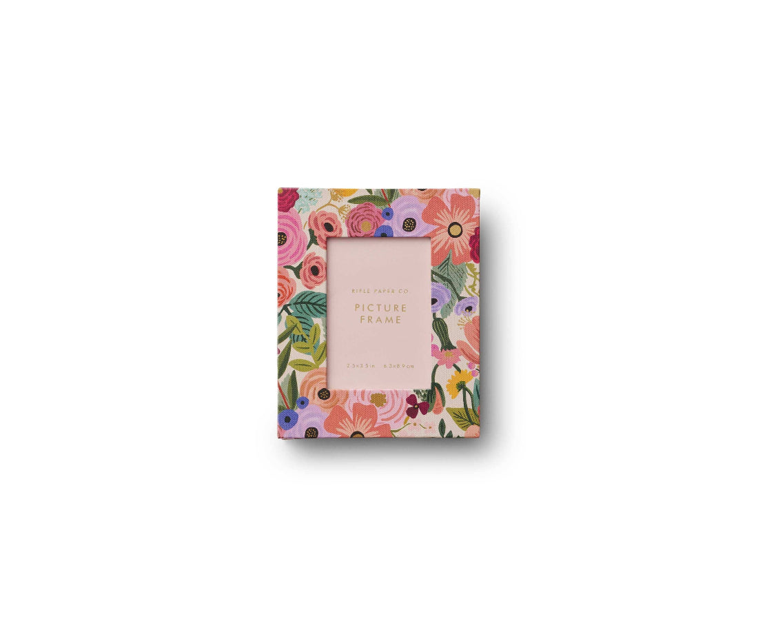 Floral patterned picture frame packaging on a white background