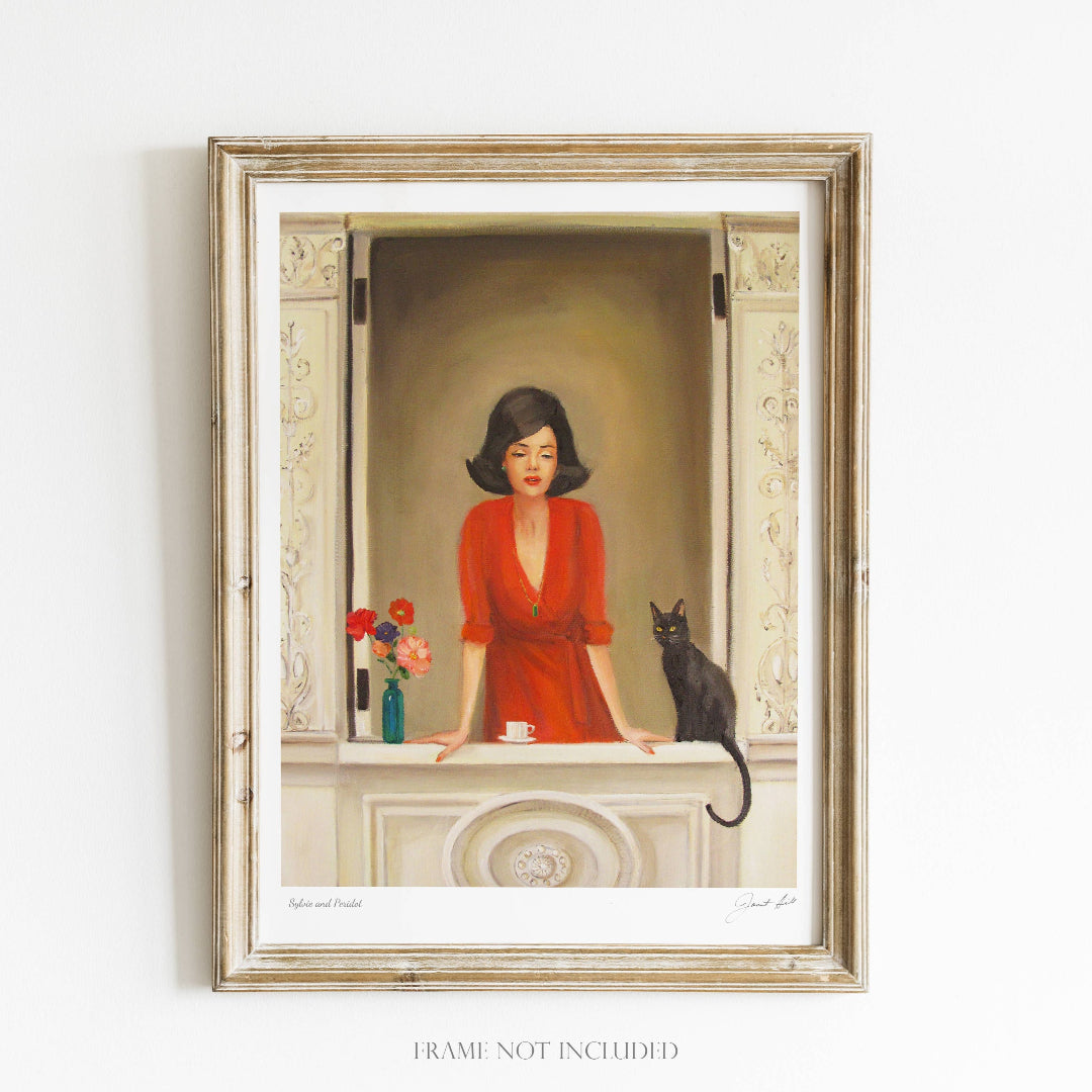 An art print featuring a woman in a red dress with a black cat on her lap, seated in a room with a window and a decorative mantelpiece.