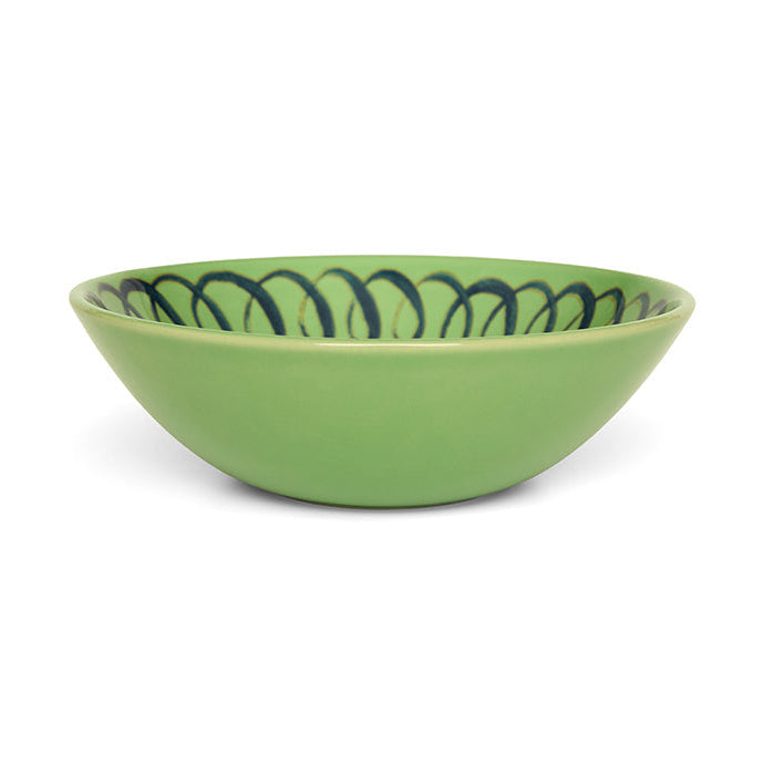 Green ceramic bowl with blue decorative pattern on a white background