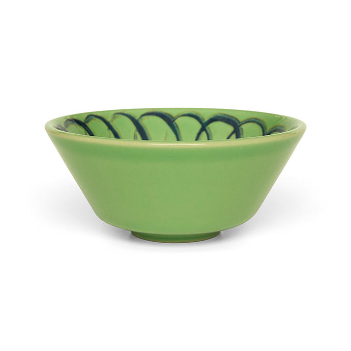 Green ceramic bowl with blue decorative rim on a white background