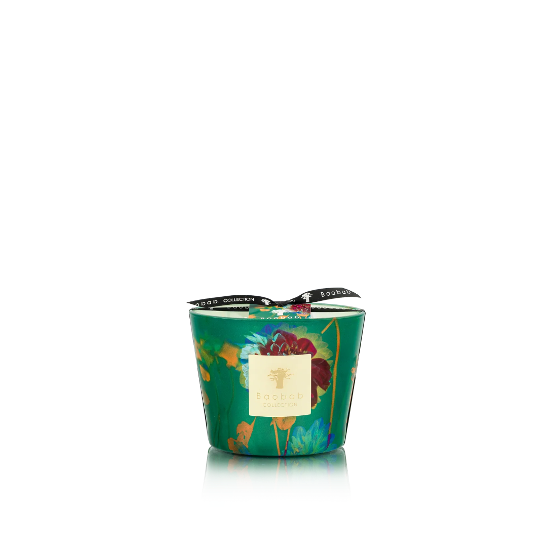 Decorative candle with floral design on a white background