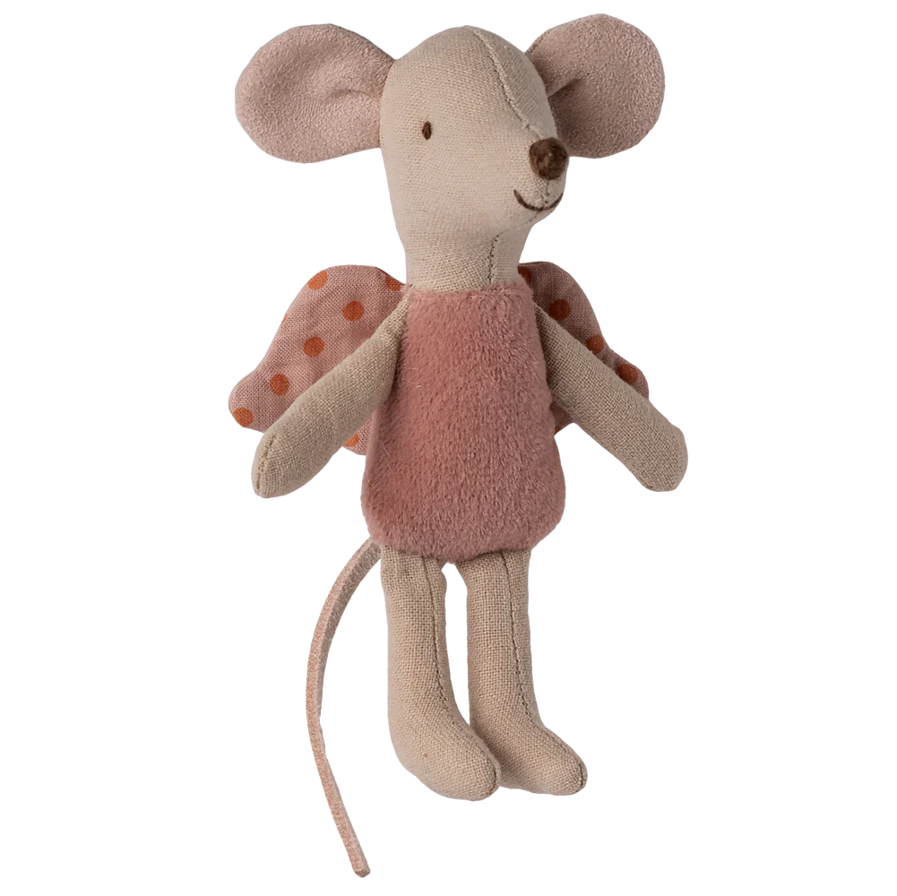 Stuffed toy mouse with a pink dress on a white background