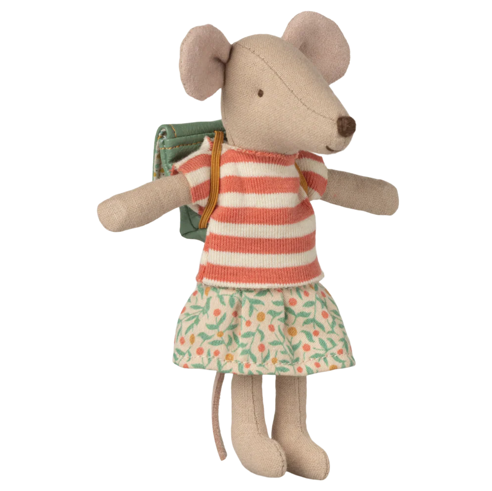 Stuffed mouse toy wearing a striped dress and wearing a green bag on a white background