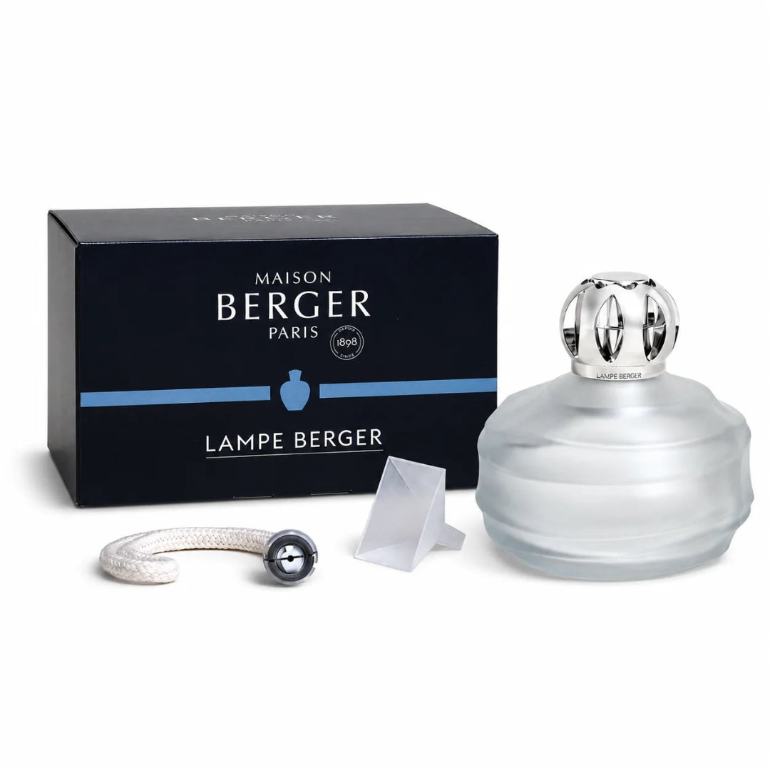 Maison Berger Paris Lampe. The lamp features a frosted glass body, a metallic silver cap, and comes with a wick/burner and a small plastic funnel.