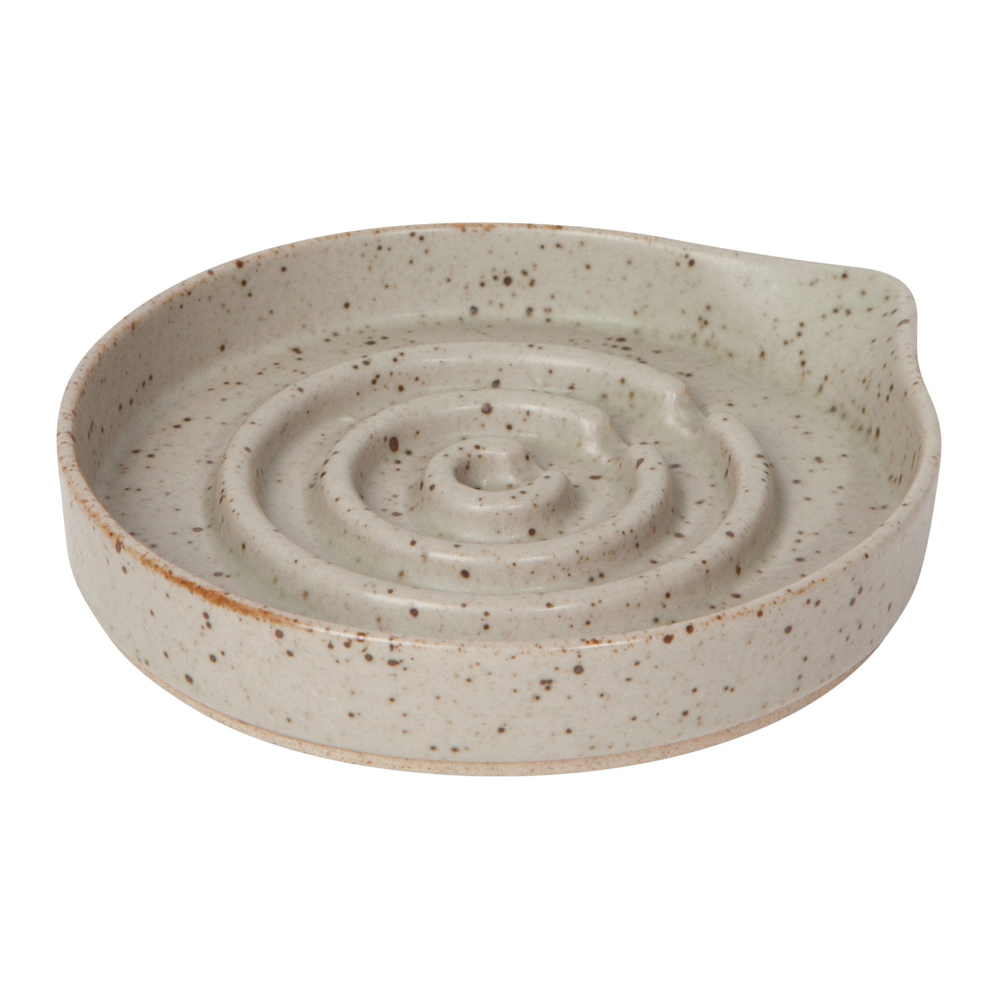 Speckled ceramic dish with spiral design on a white background