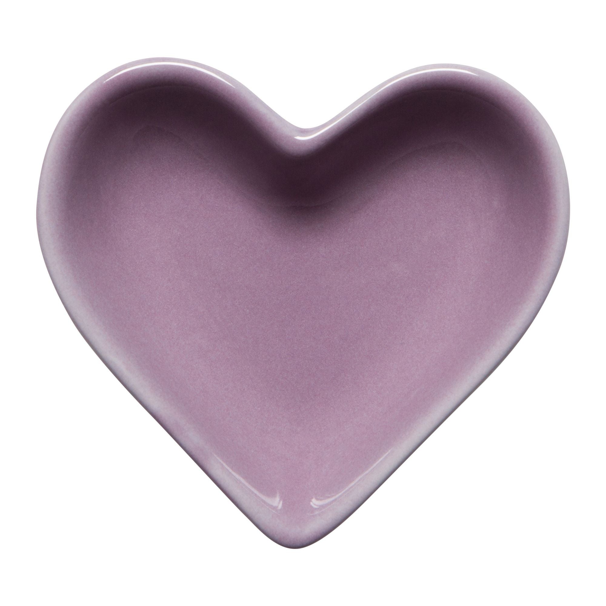 Heart-shaped purple ceramic dish on a white background