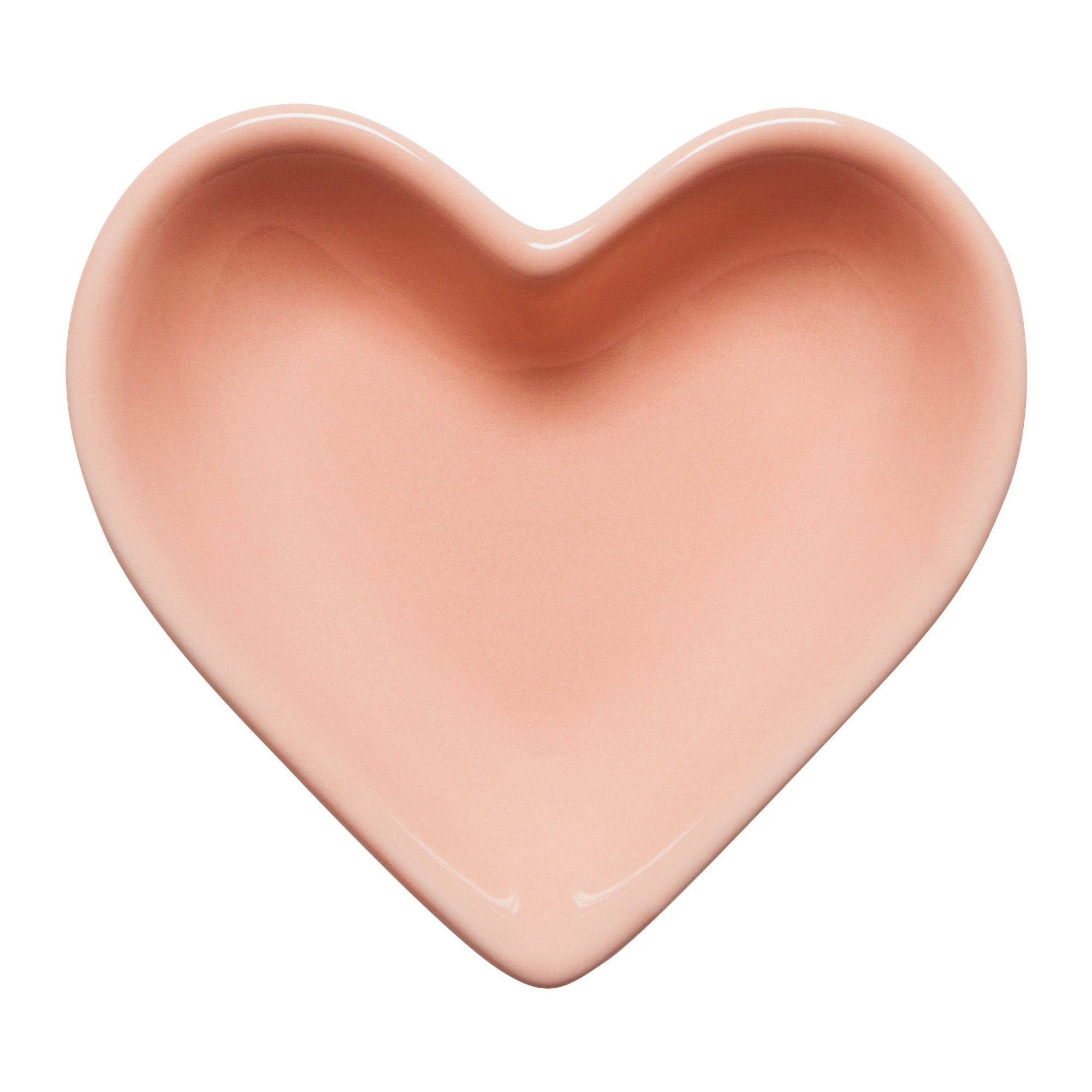 Heart-shaped pink ceramic dish on a white background