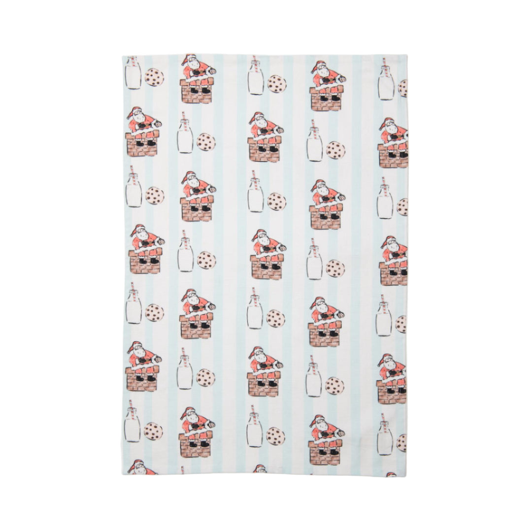 Patterned tea towel with Santa Claus and milk & cookies design on a light blue & white background
