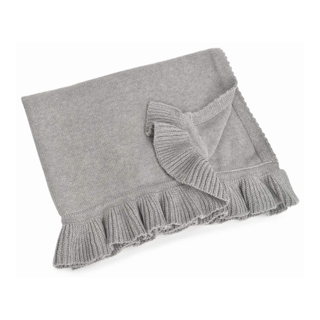 Gray knit blanket with ruffled edge on a white background