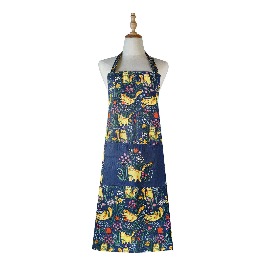 Navy apron with colorful cat and floral pattern on a mannequin against a white background