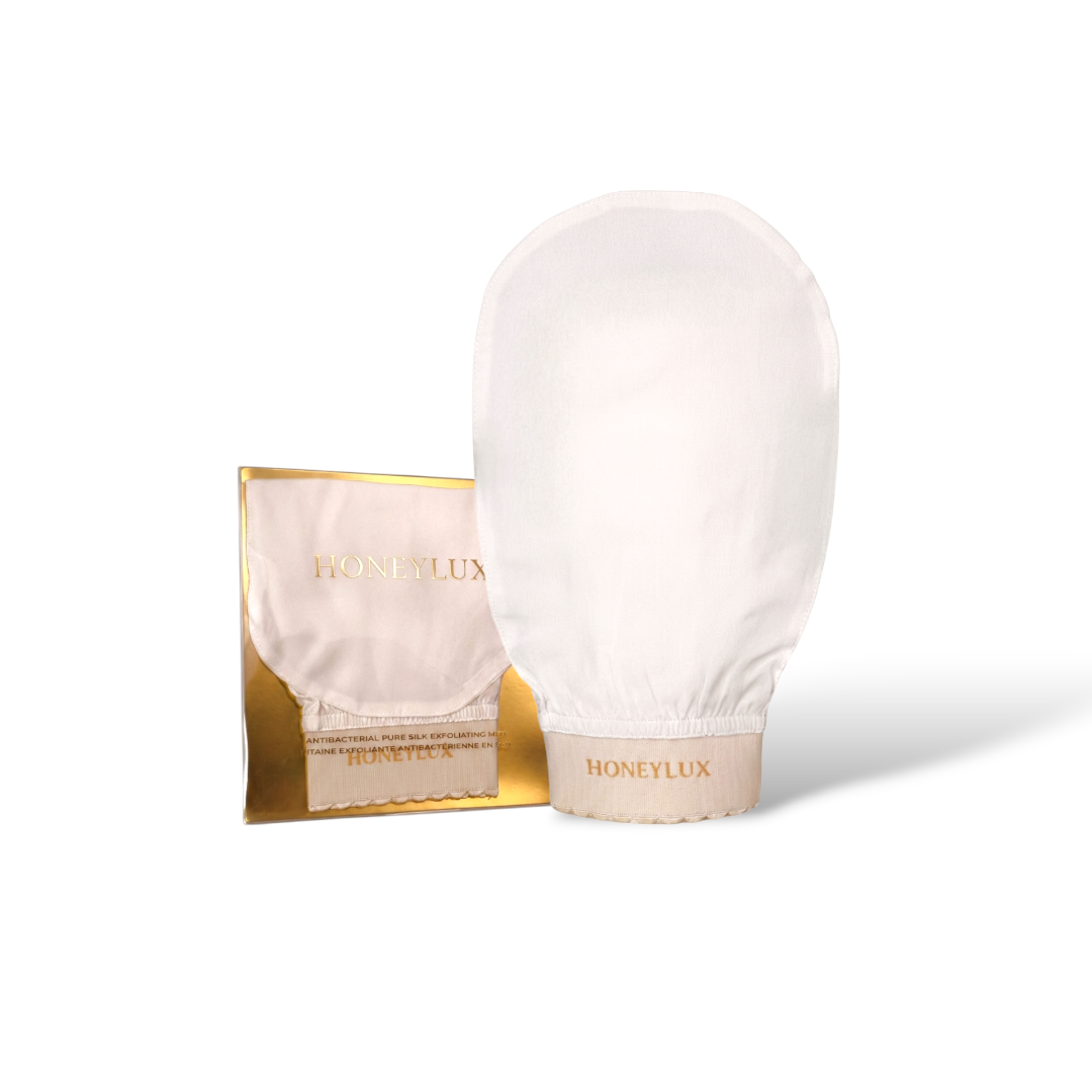 White glove with gold Honeylux packaging on a white background