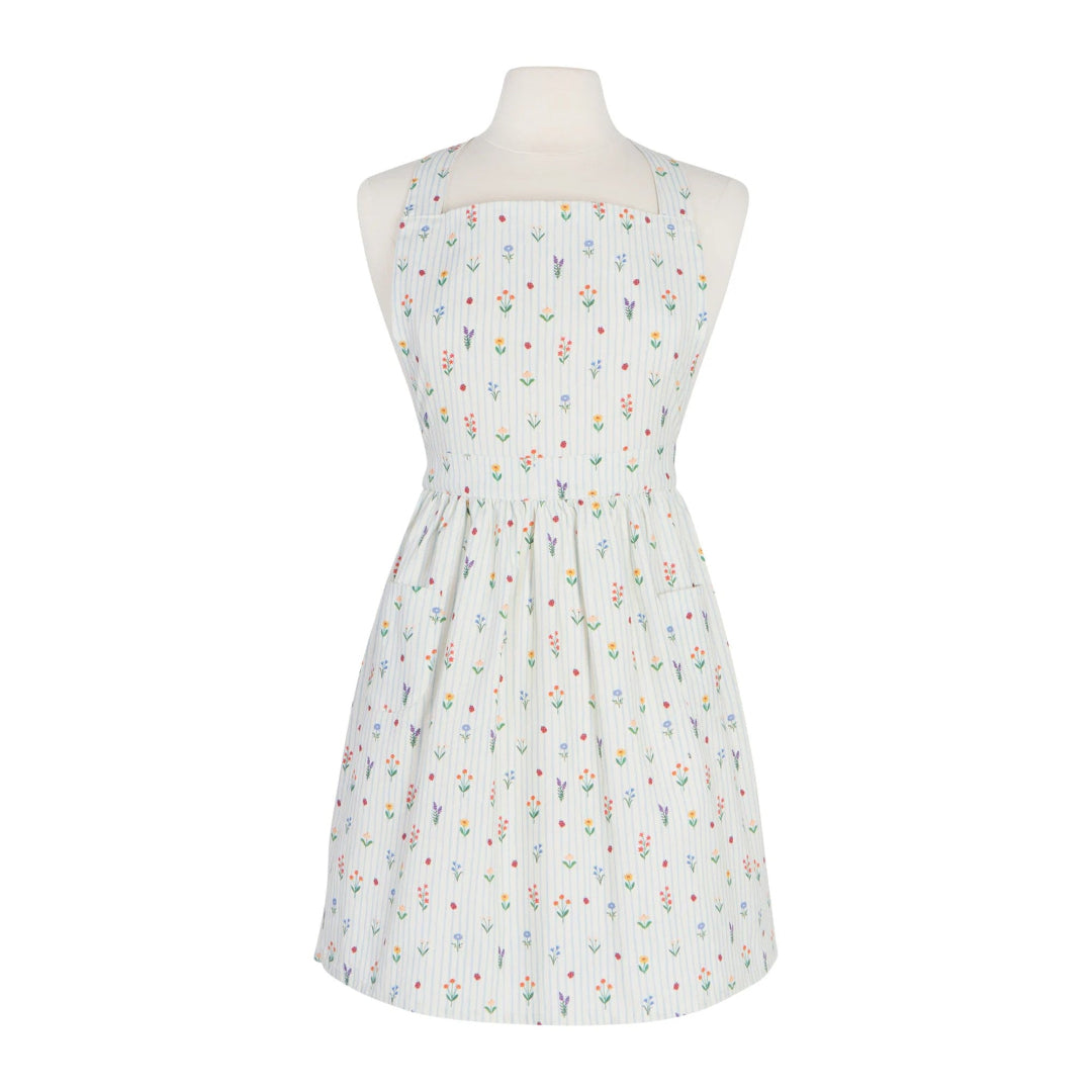 Floral dress on a mannequin against a white background