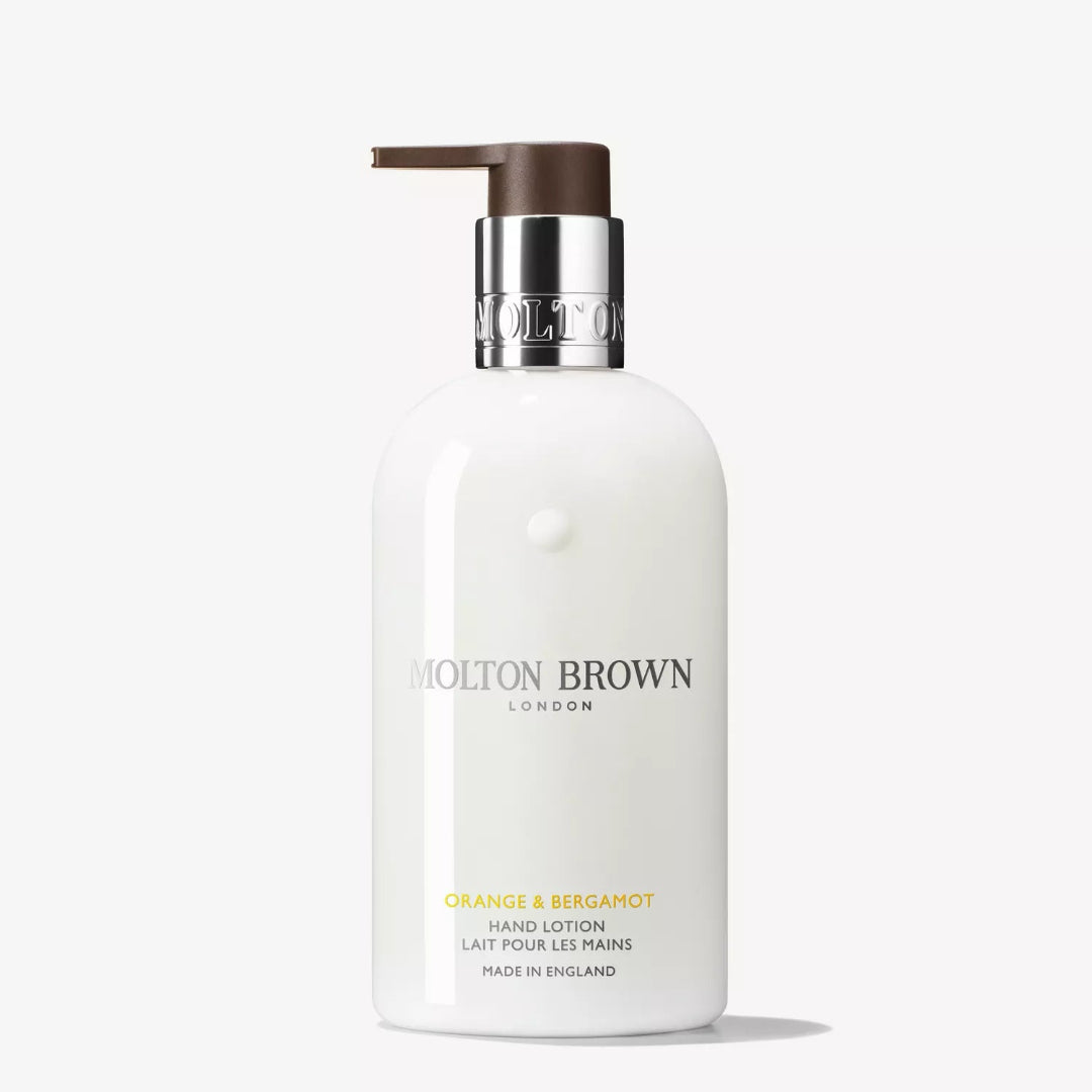 Molton Brown hand lotion bottle on a white background