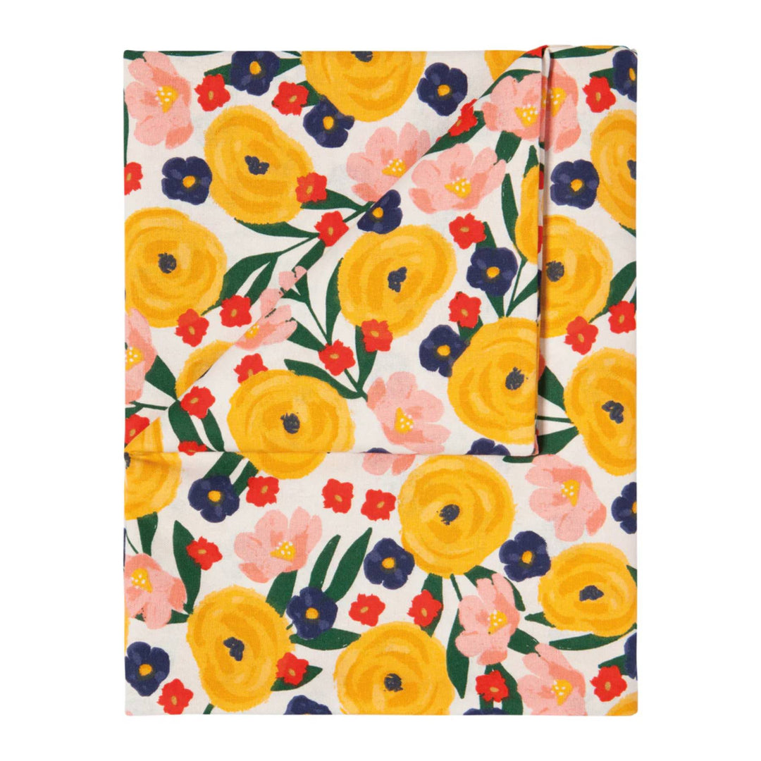 Floral patterned fabric with yellow flowers on a white background