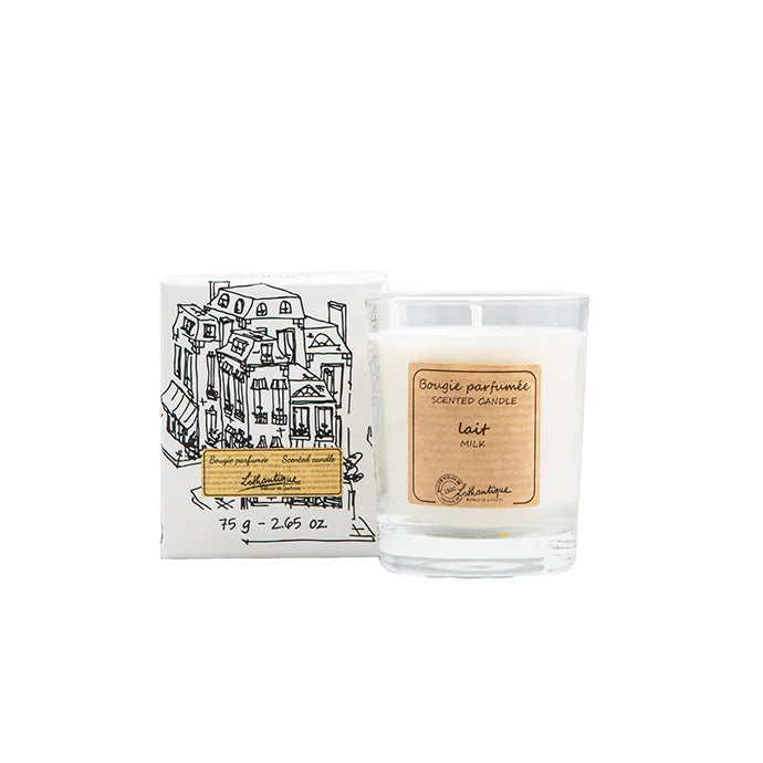 Candle with packaging featuring a building illustration on a white background