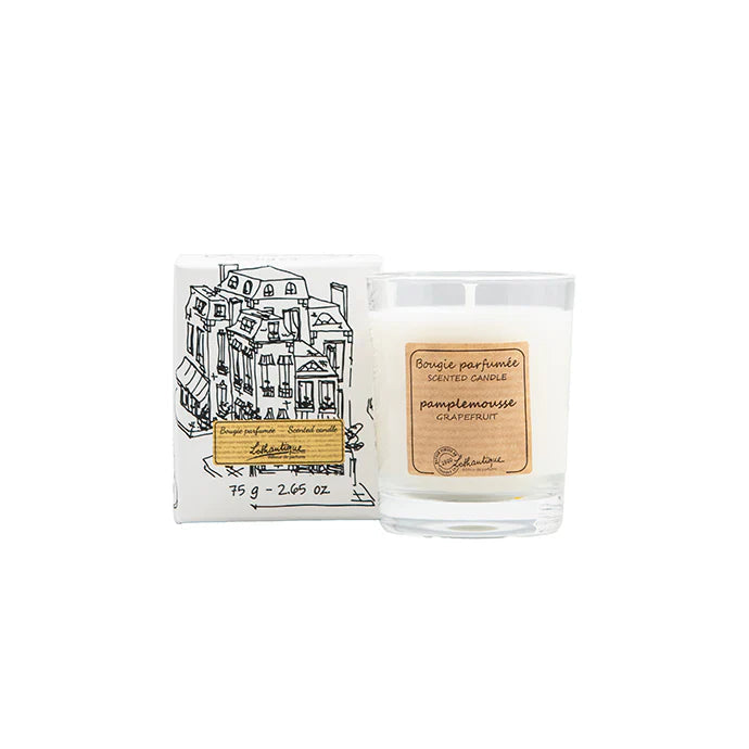 Scented candle with packaging featuring a building illustration on a white background