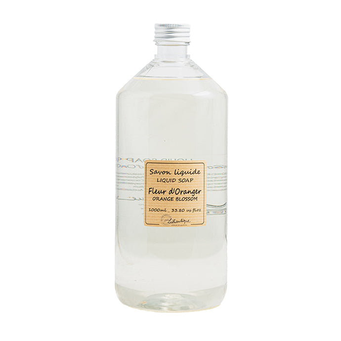 A clear plastic bottle of liquid soap refill labeled 'Authentique Orange Blossom'.