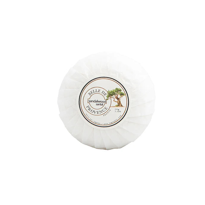 White bar of soap with a label on a white background