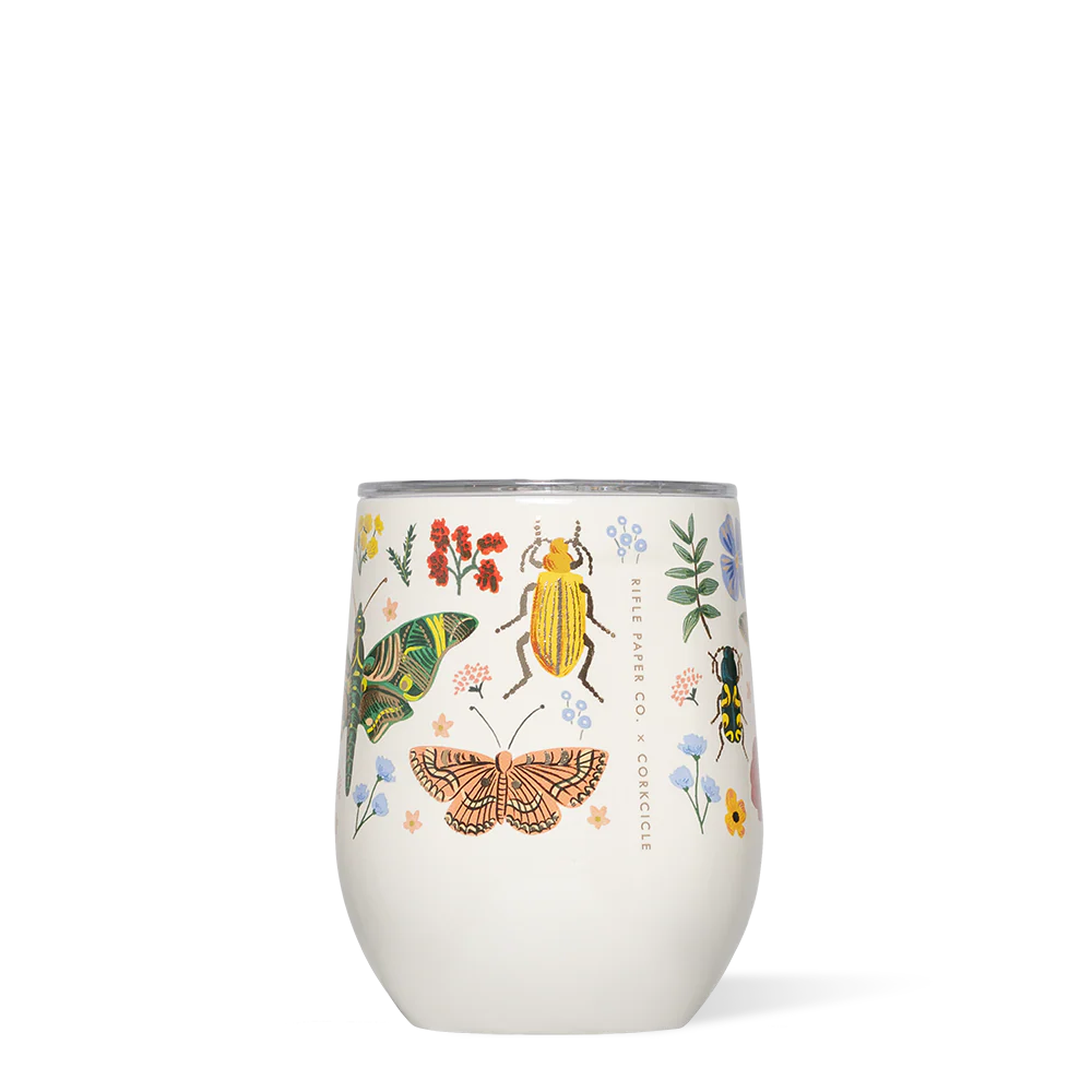 Stemless wine glass with insect and floral design on a white background
