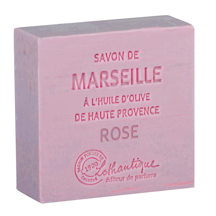 A rectangular pink bar of Marseille soap with embossed French text reading 'SAVON DE MARSEILLE', 'ROSE', and a circular 'Lothantique 1920' logo, shown on a plain white background.